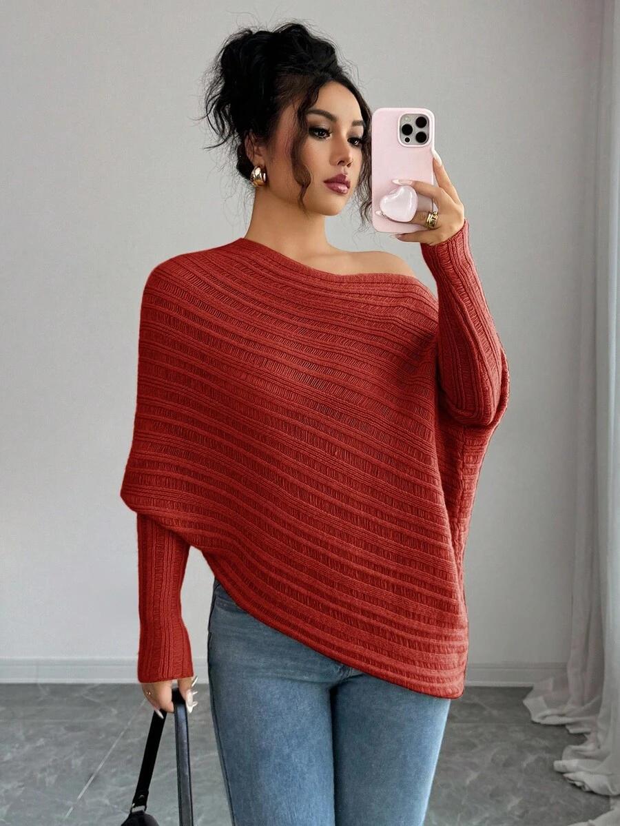 pomarańczowy sweter asymetryczne dekolt