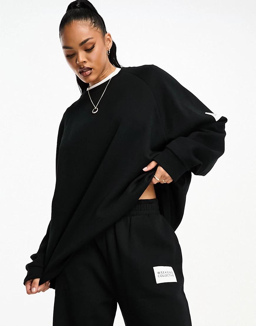 CZARNA BLUZA BEZ KAPTURA OVERSIZE OKRĄGŁY DEKOLT NASZYWKA