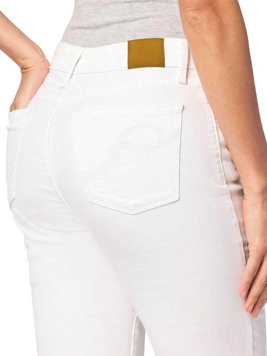 białe spodlenie jeans