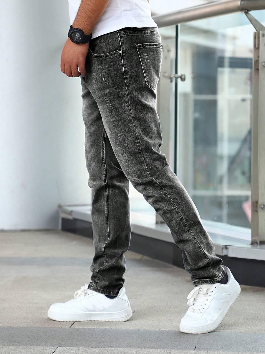 ZWĘŻANE SPODNIE JEANS