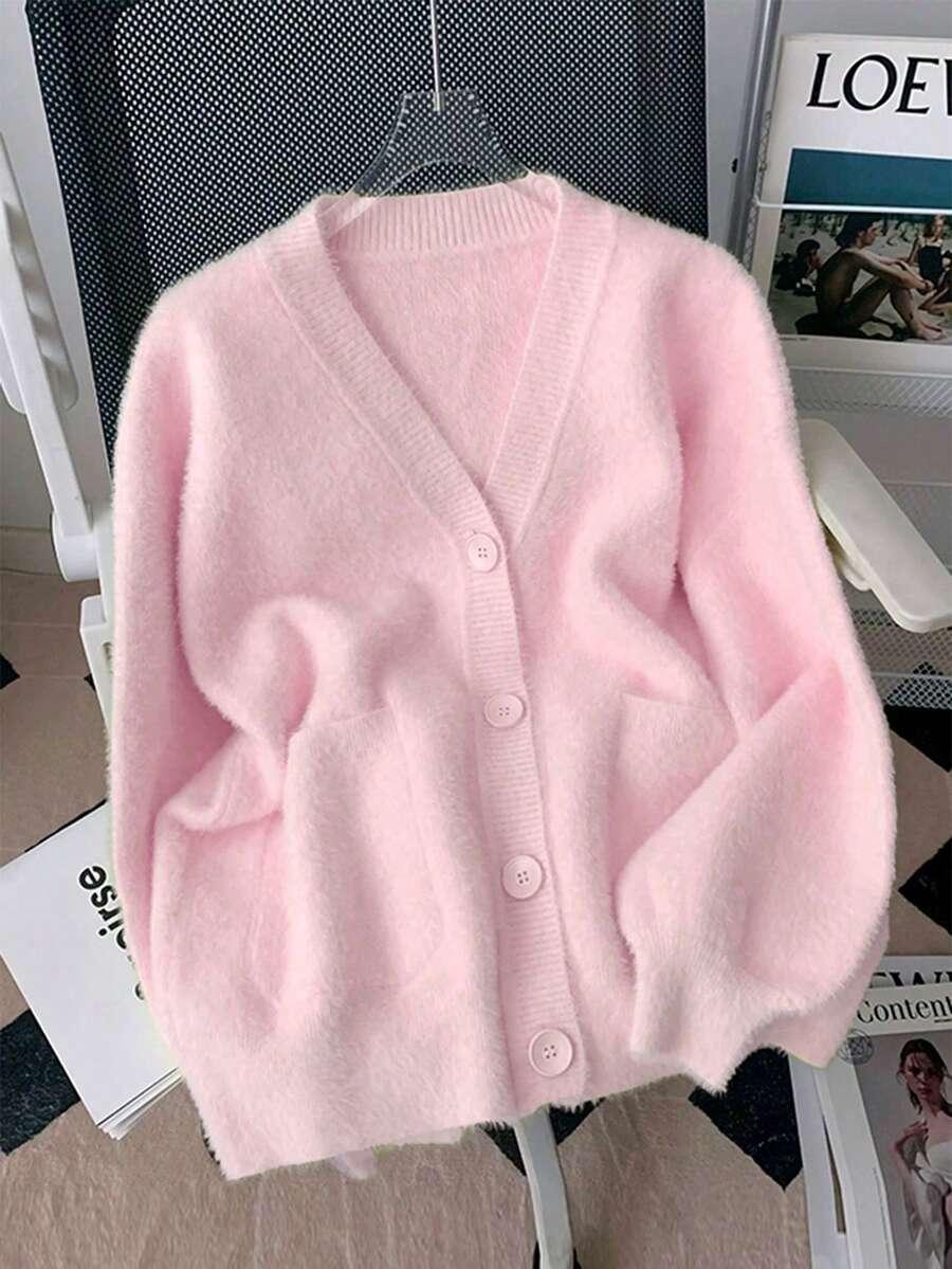 RÓŻOWY SWETER GUZIKI