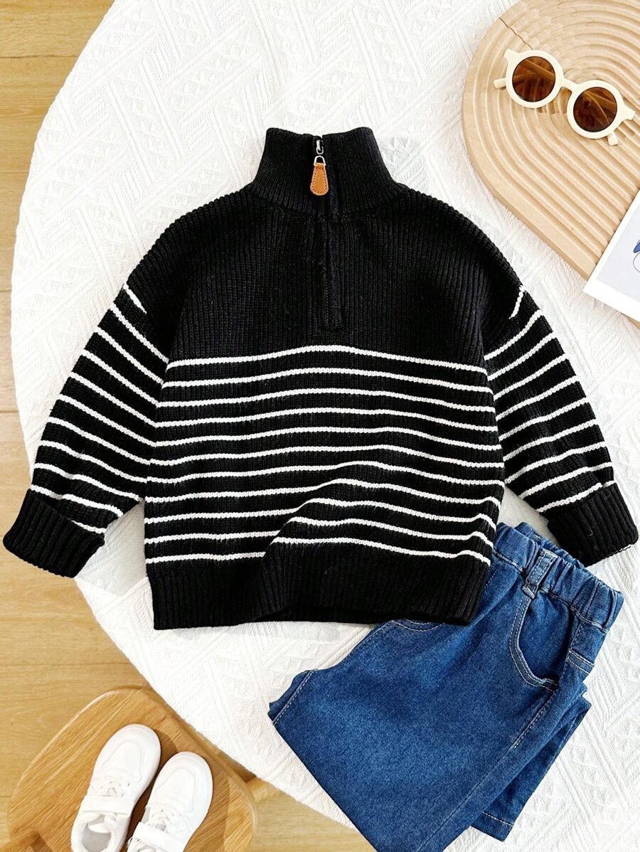 czarny sweter paski