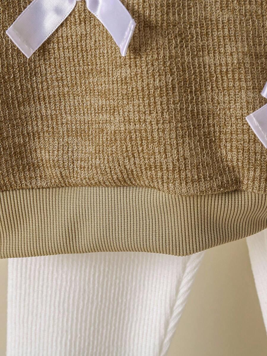 komplet sweter spodnie