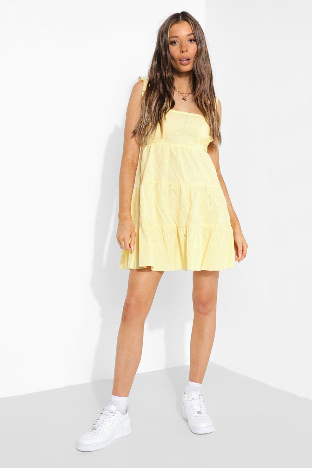 żółta mini sukienka bez rękawów falbana 
