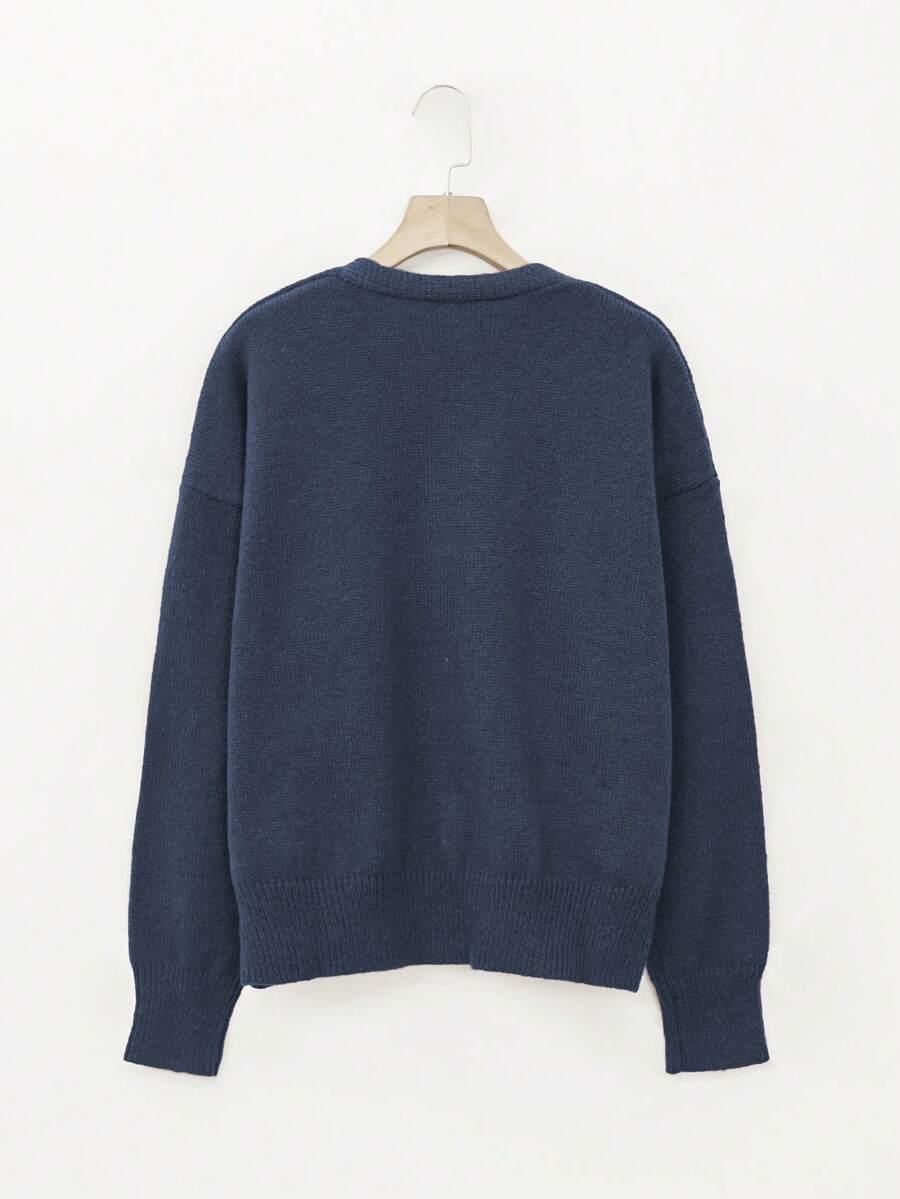 granatowy sweter guziki