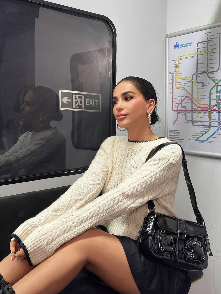 kremowy dzianinowy sweter