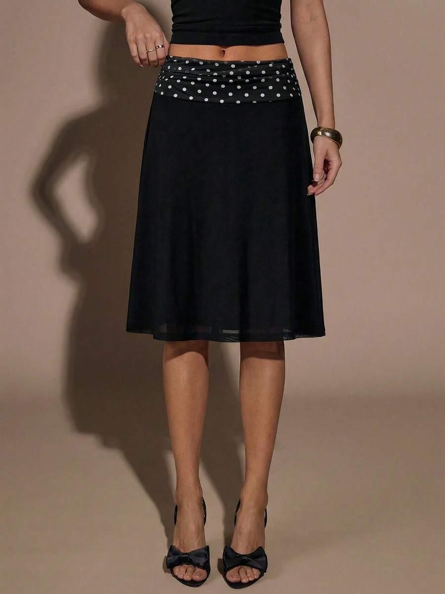 czarna midi spódnica groszki