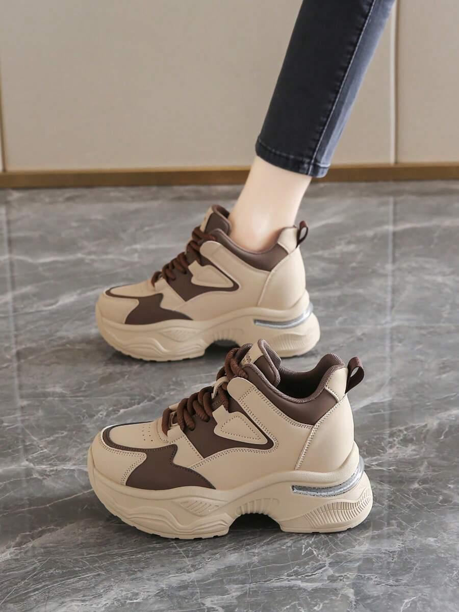 sznurowane buty sportowe