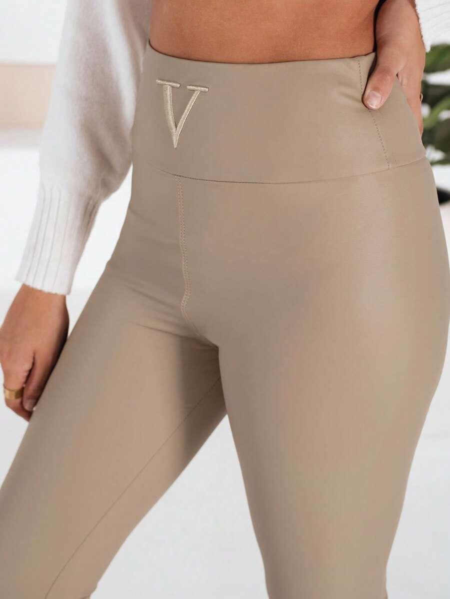 beżowe legginsy imitacja skóry