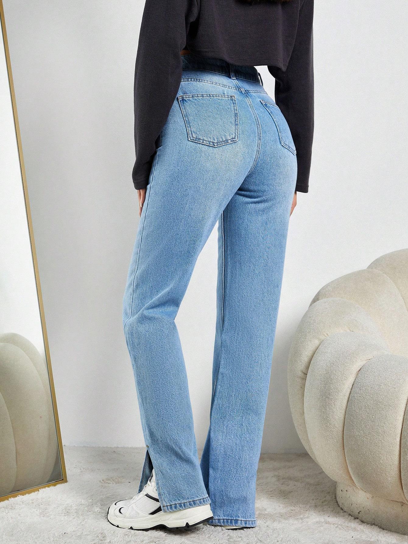 niebieskie spodnie jeans rozcięcia