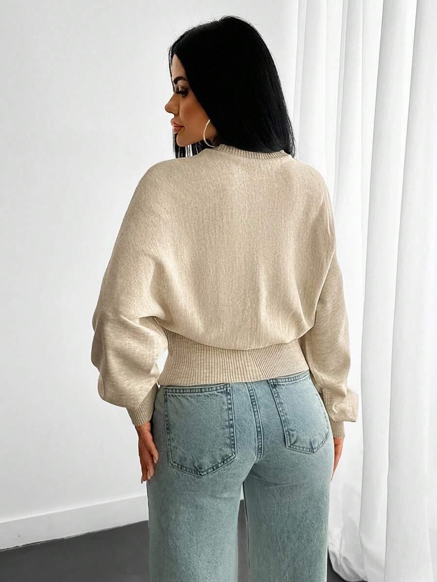 beżowy dzianinowy sweter 