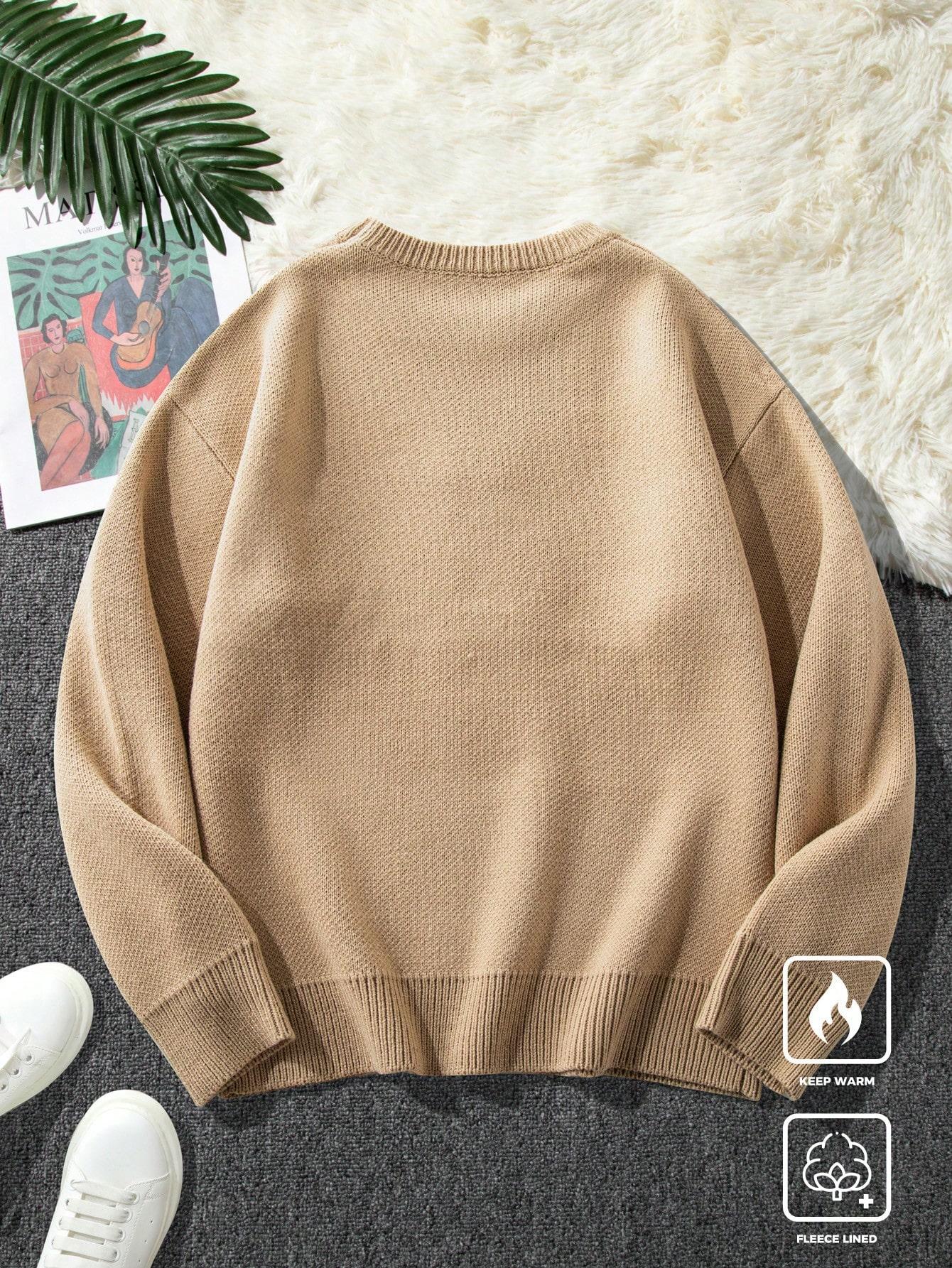 SWETER Z HAFTOWANYM MOTYWEM