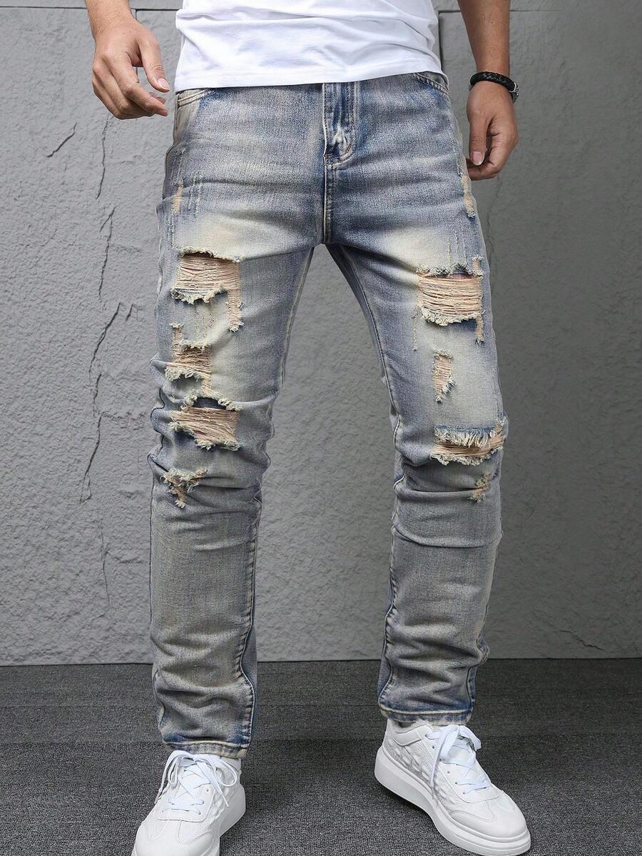 SPODNIE JEANSOWE Z PRZETARCIAMI