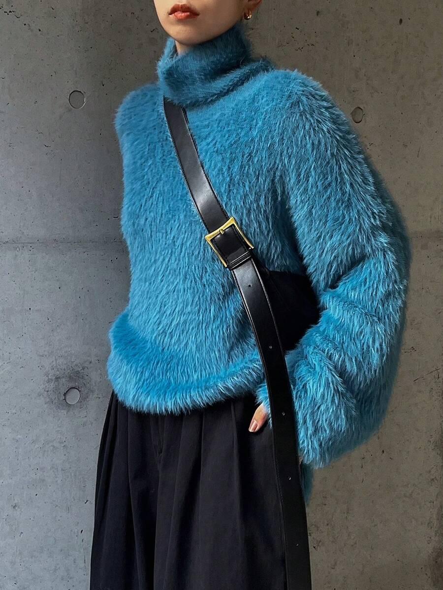 niebieski sweter miś