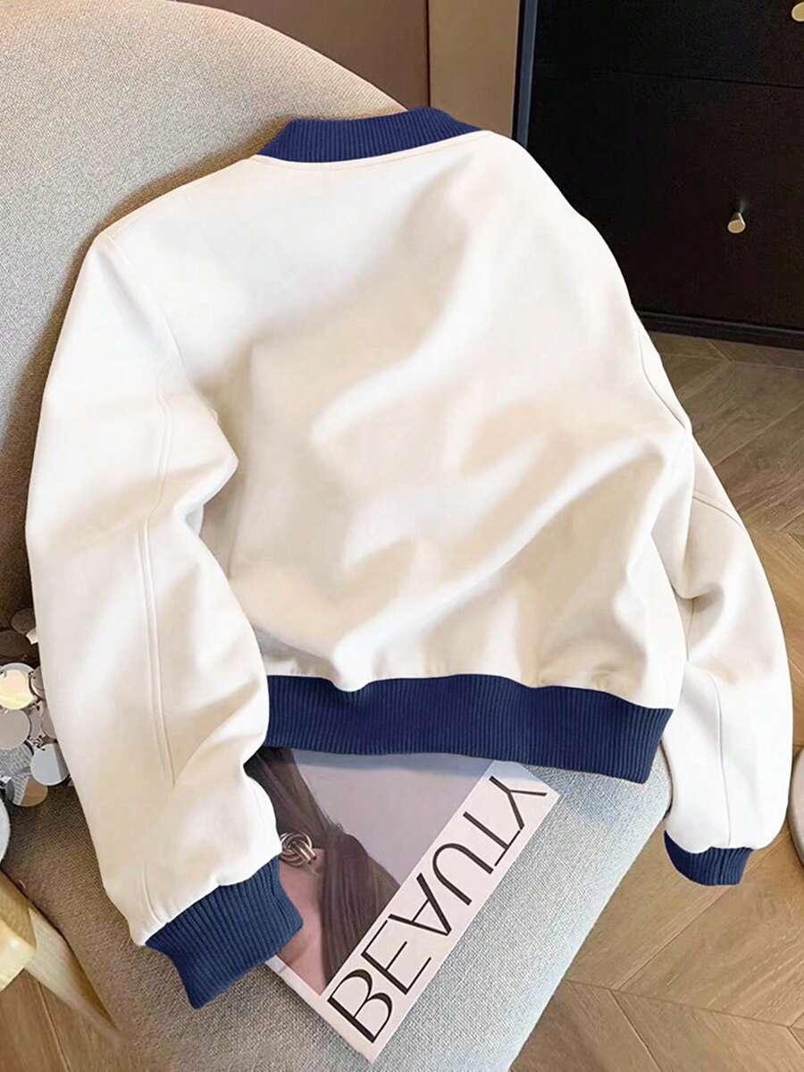 biała kurtka bomber