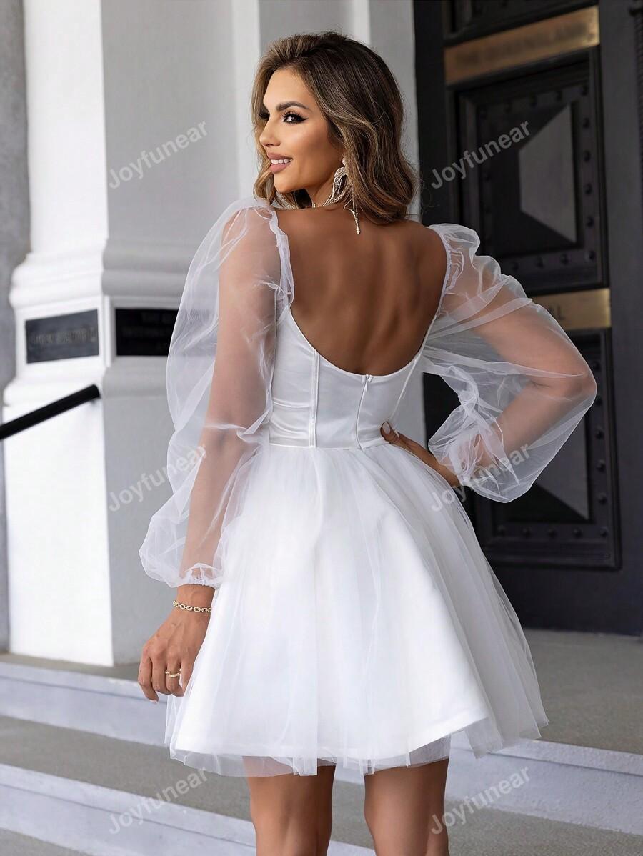 BIAŁA ROZKLOSZOWANA SUKIENKA ORGANZA