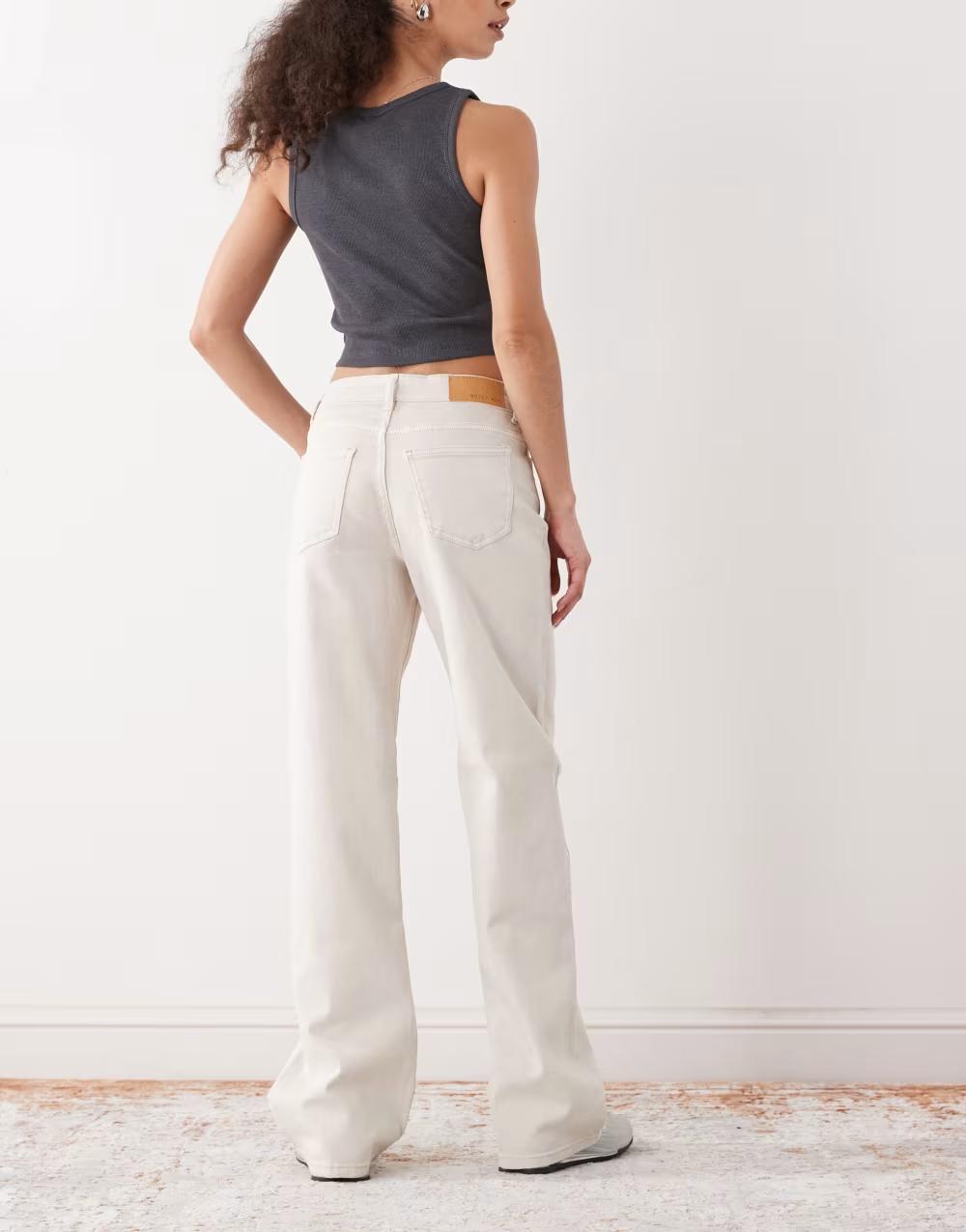ecru spodnie jeans zamek