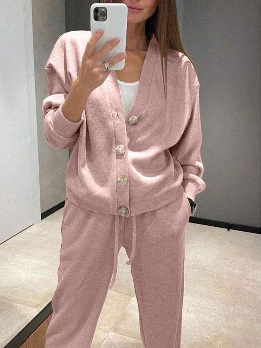 różowy sweter spodnie komplet