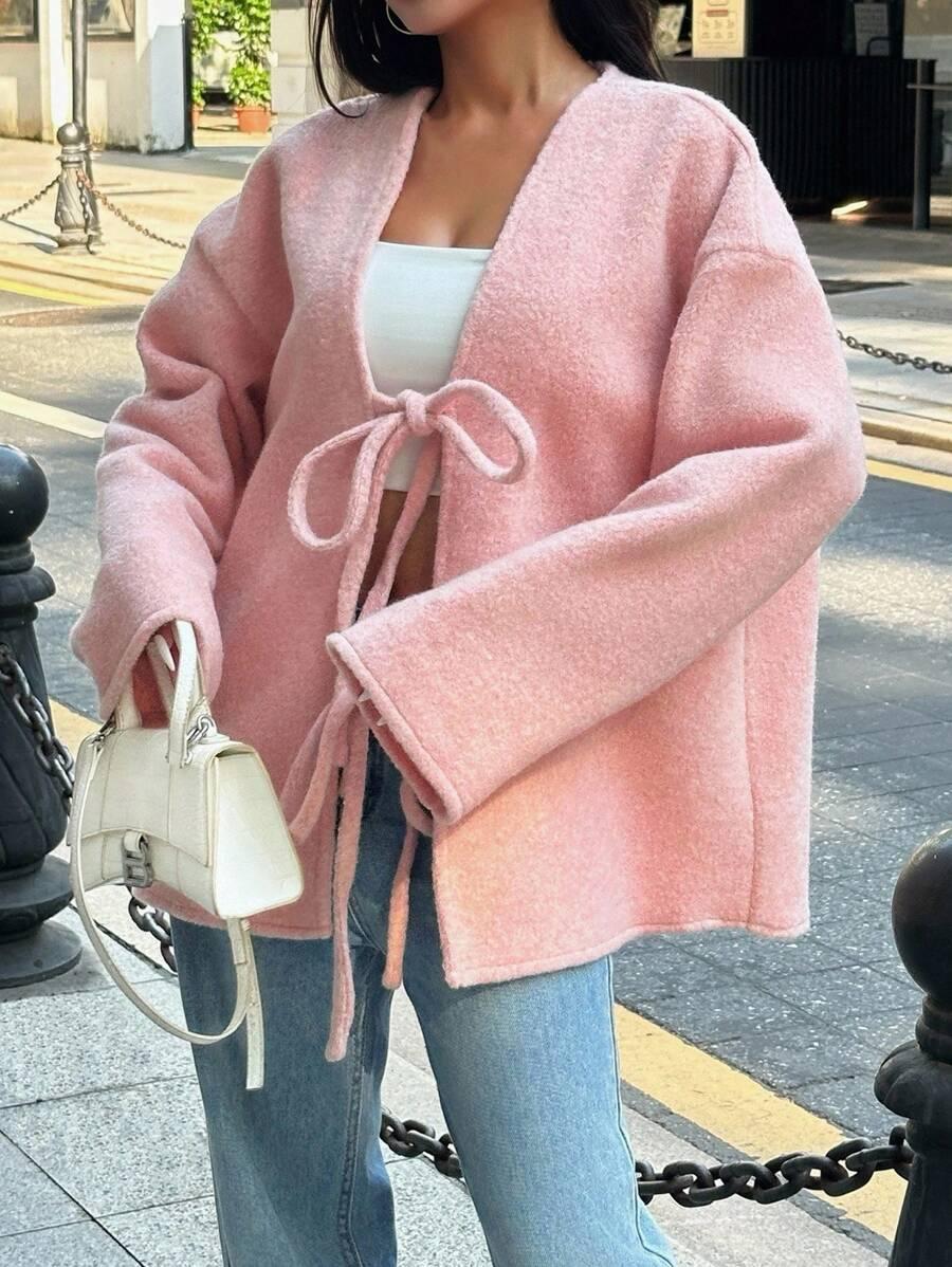 różowy sweter wiązanie