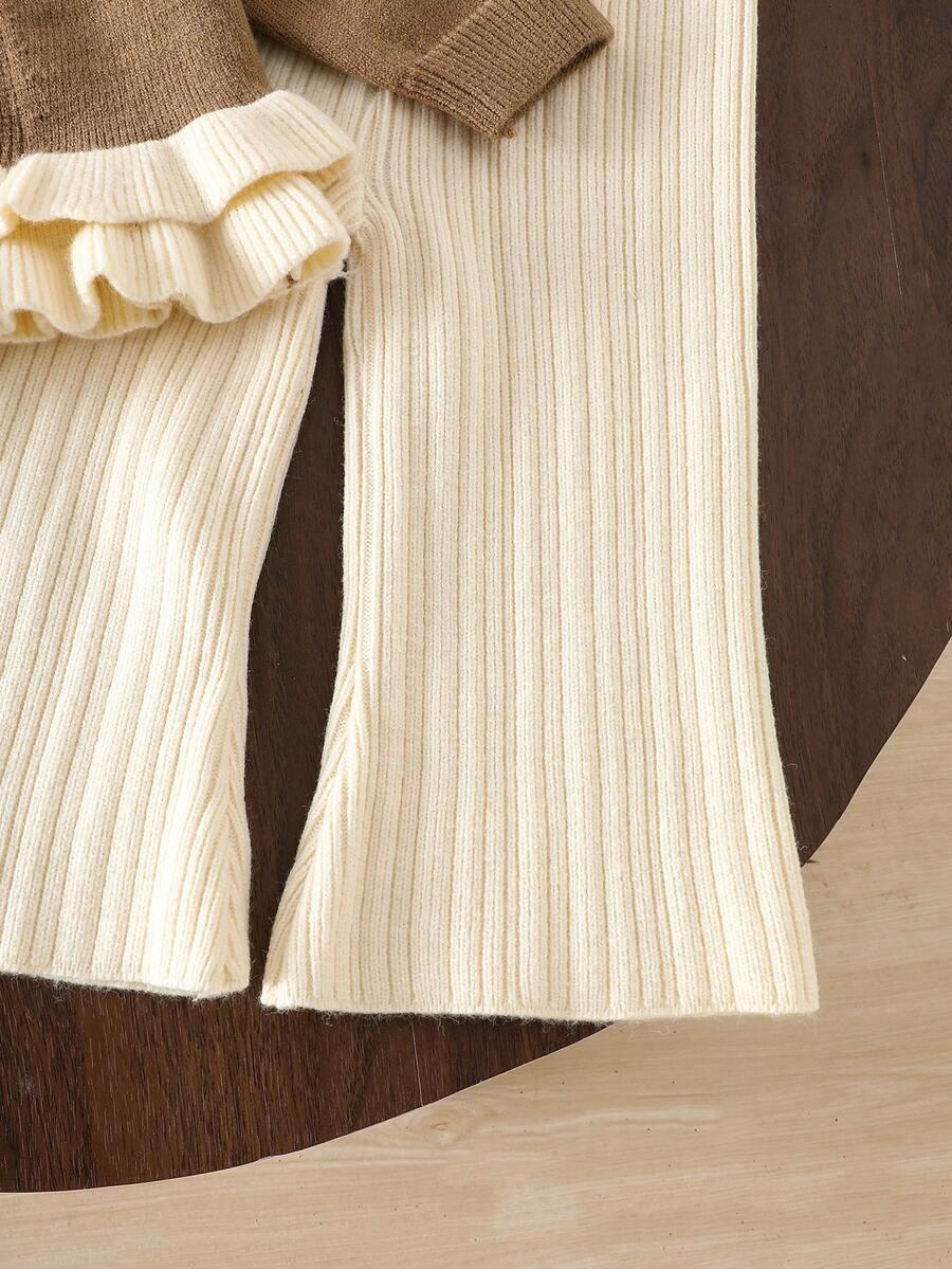 komplet sweter spodnie