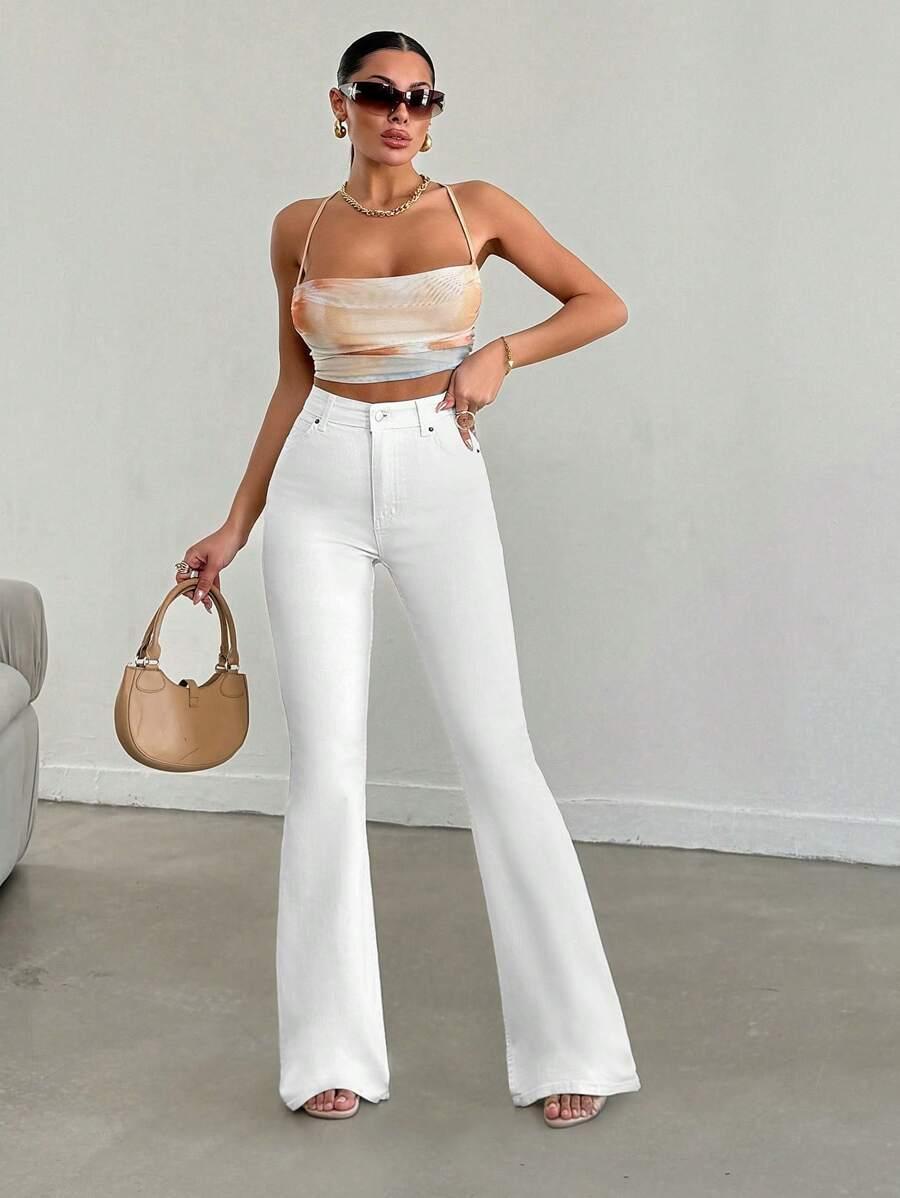 BIAŁE SPODNIE JEANS