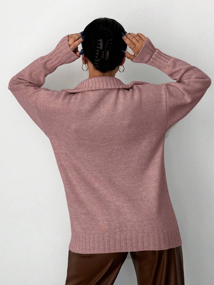 różowy sweter zamek