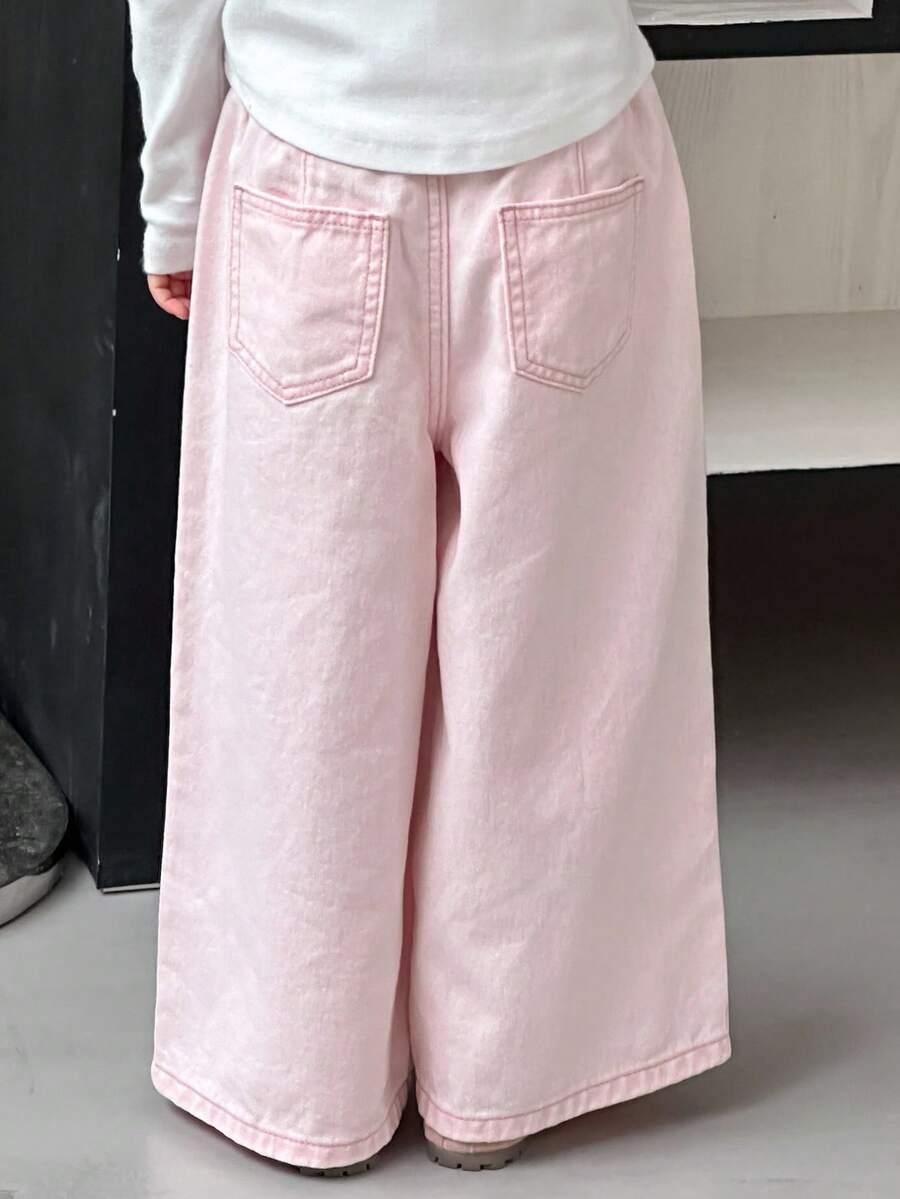 różowe spodnie jeans
