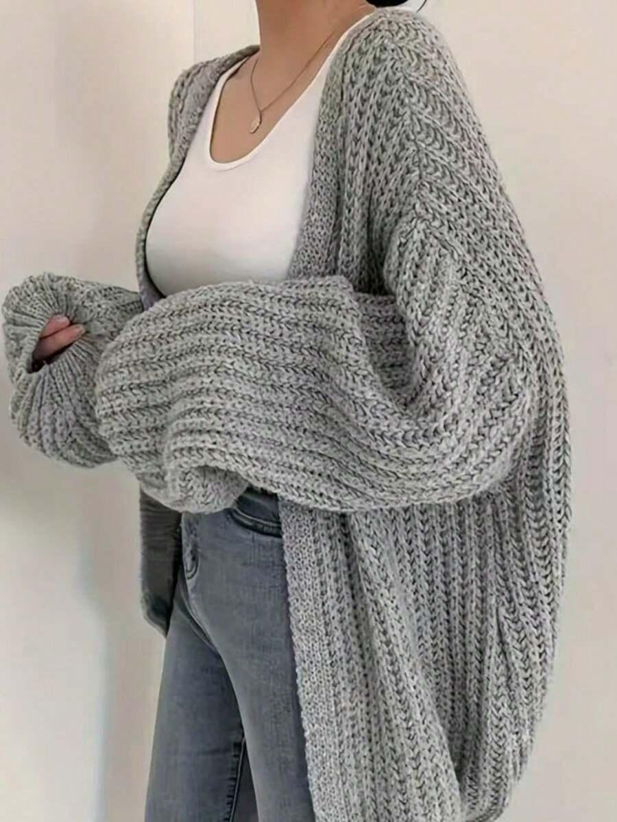 szary sweter splot