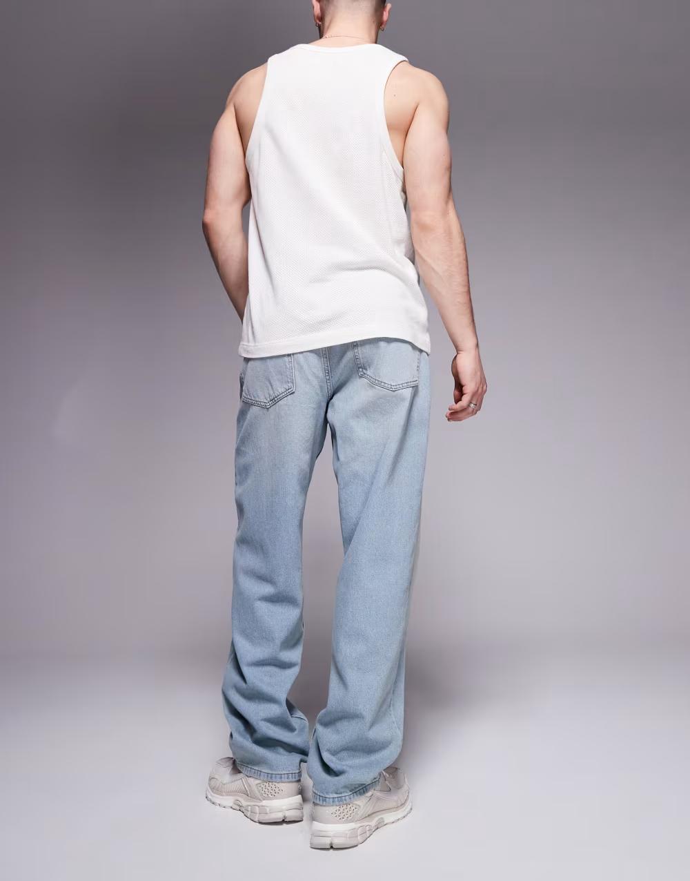 niebieskie spodnie jeans zamek