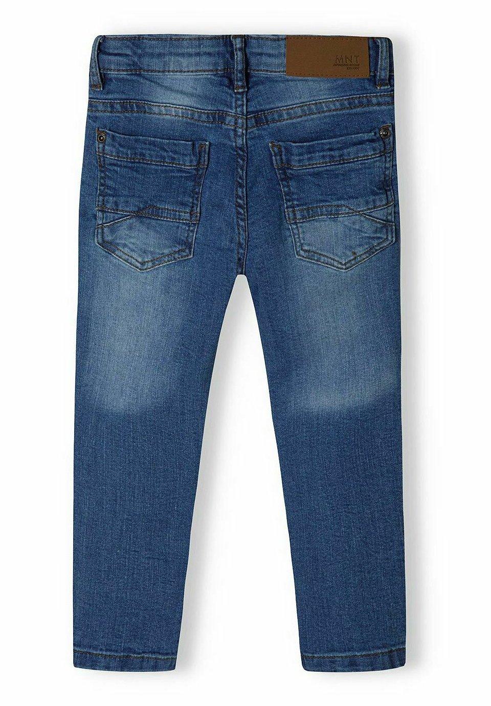 przecierane spodnie rurki jeansy