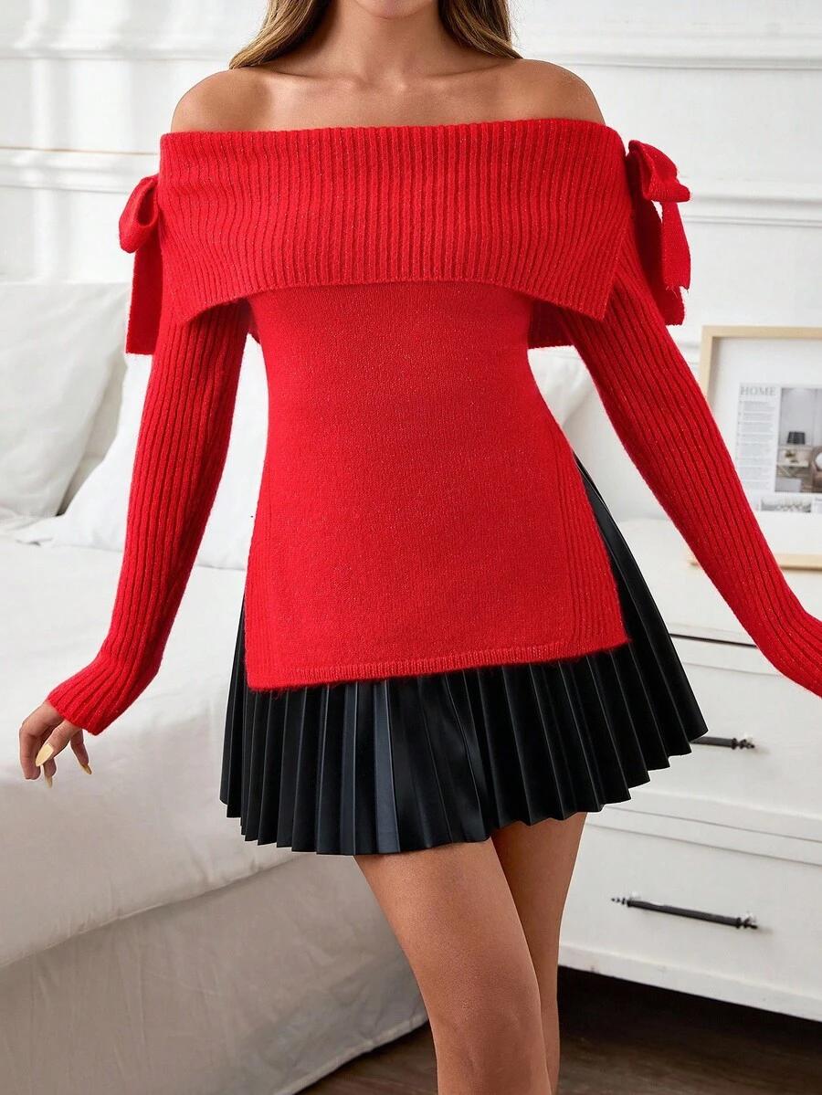 czerwony sweter odkryte ramiona