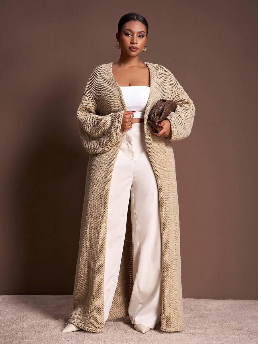 beżowy sweter do kostek