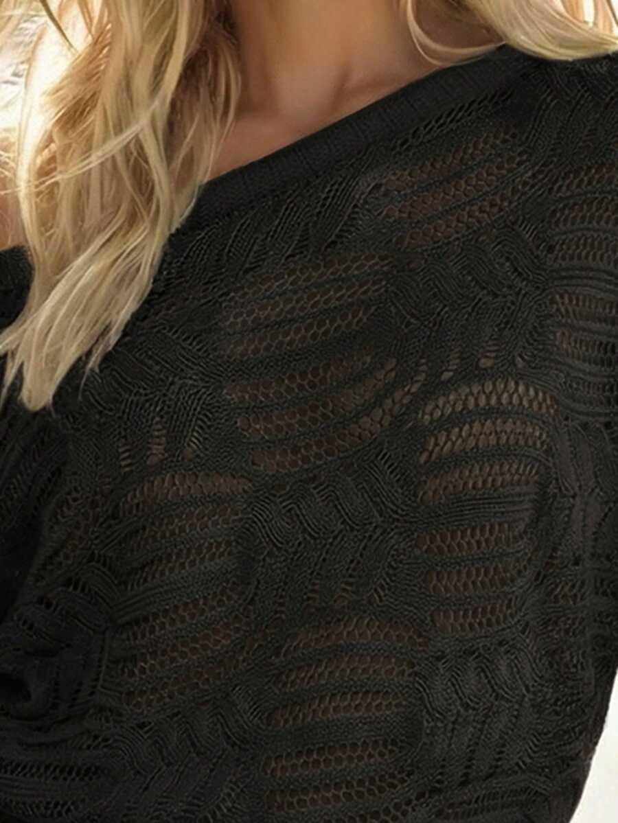 czarny sweter wycięcia