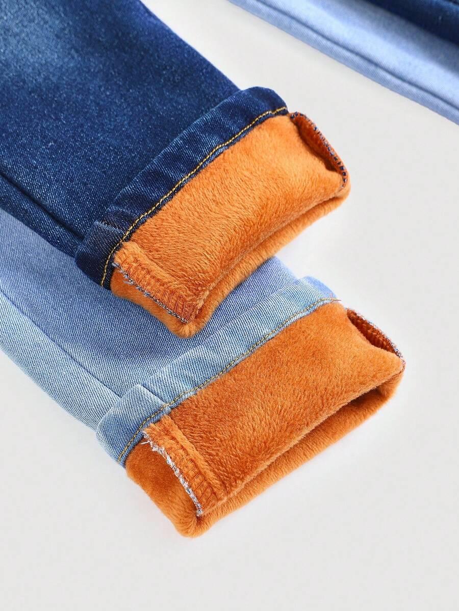 niebieskie ocieplane spodnie jeans
