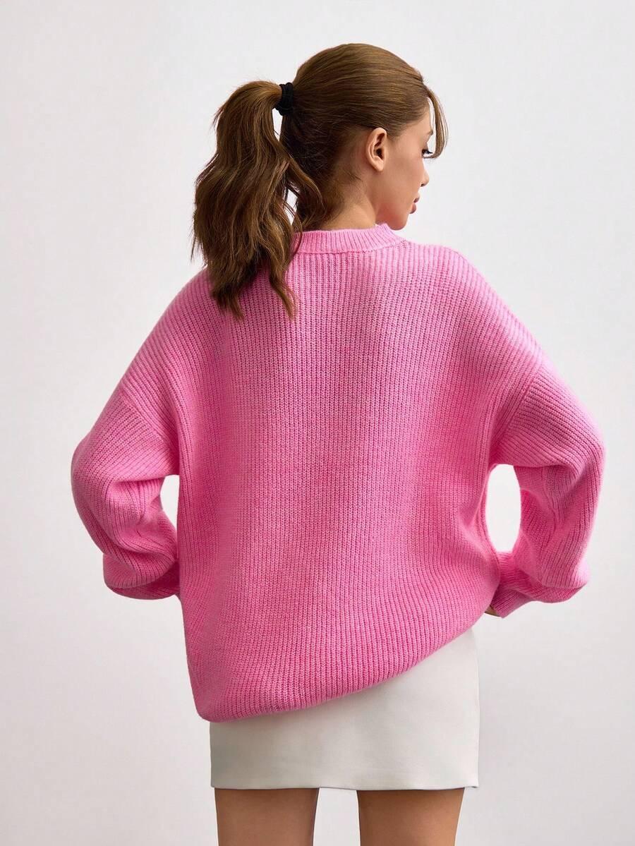 różowy sweter ściągacz