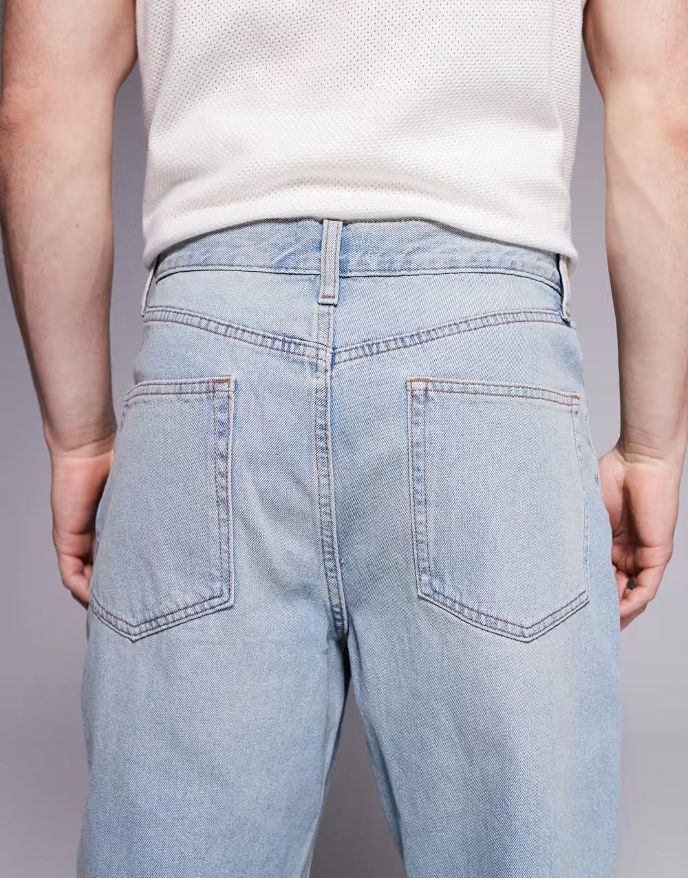 niebieskie spodnie jeans zamek