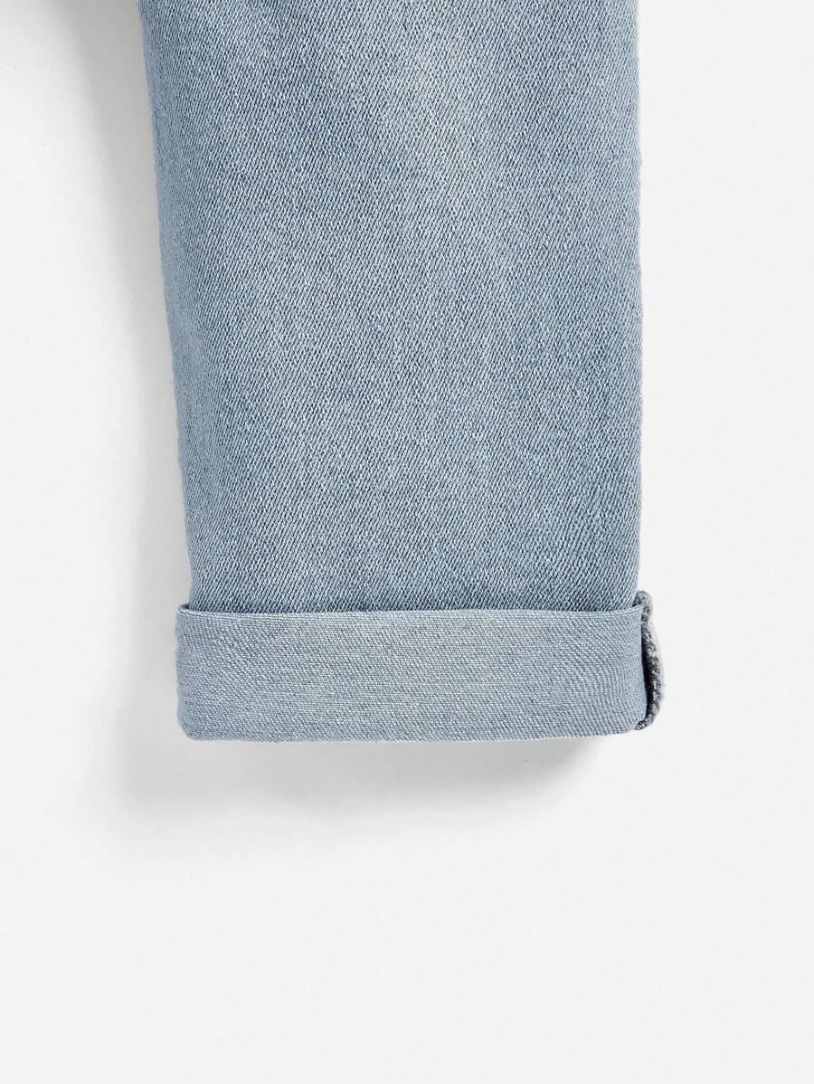niebieskie spodnie jeans 
