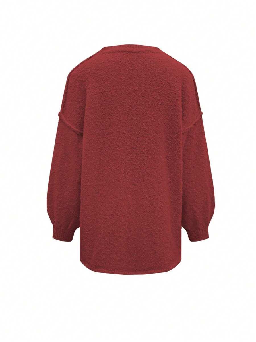 czerwony sweter okrągły dekolt