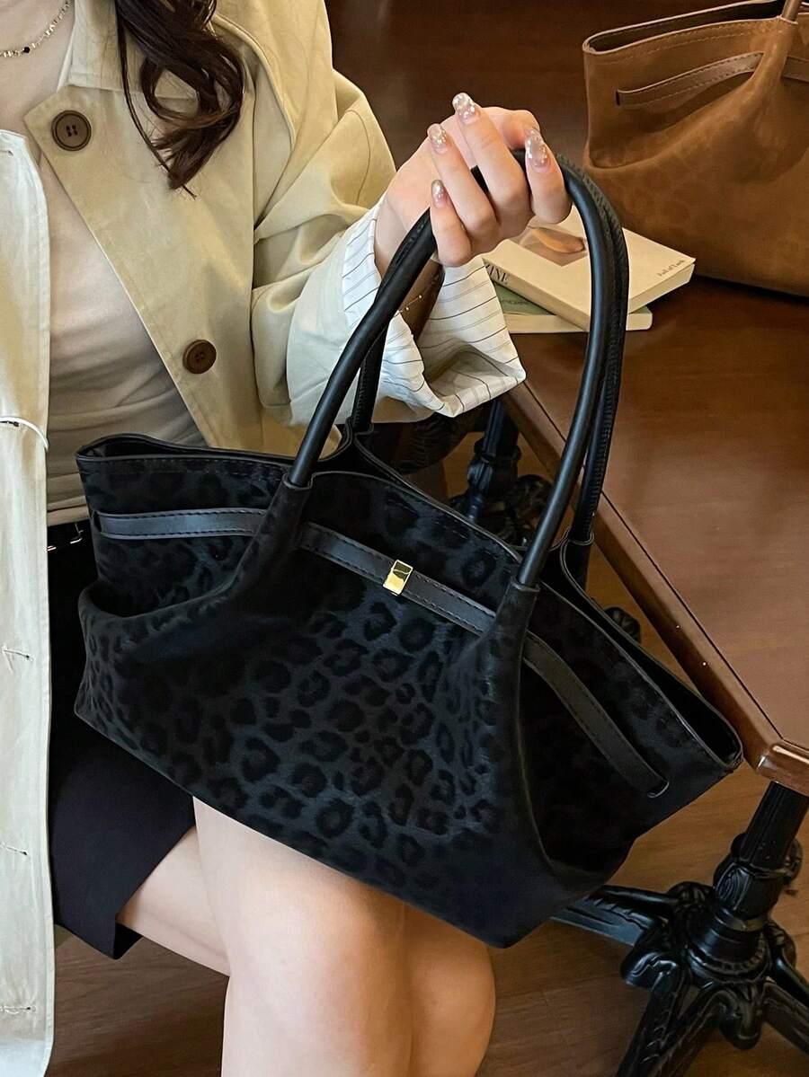 czarna torebka animal print