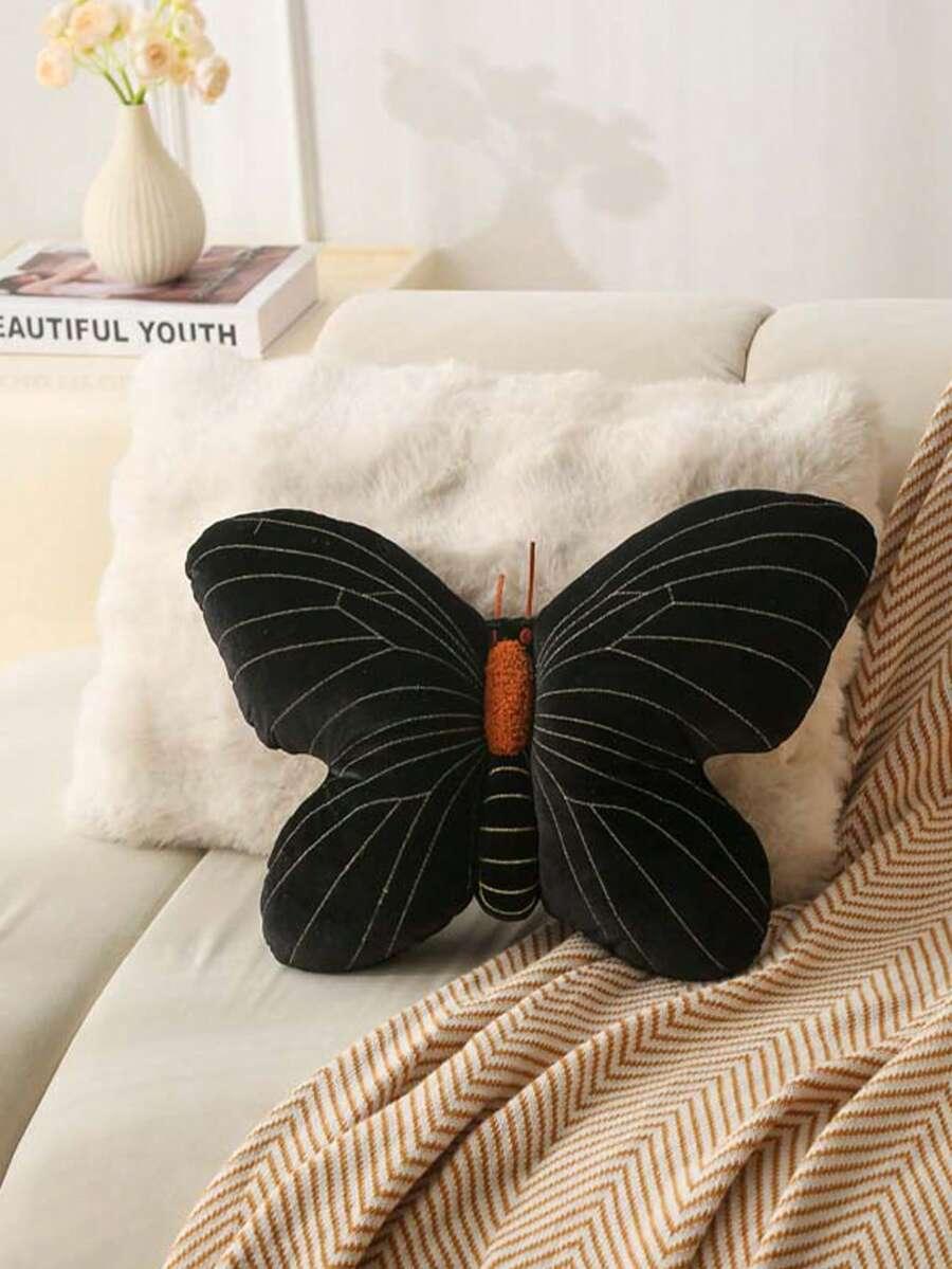 czarna poduszka motyl