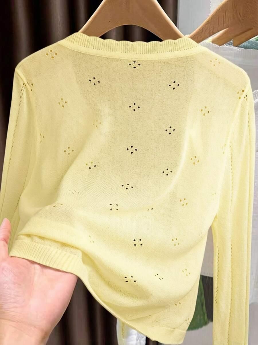 żółty sweter guziki 