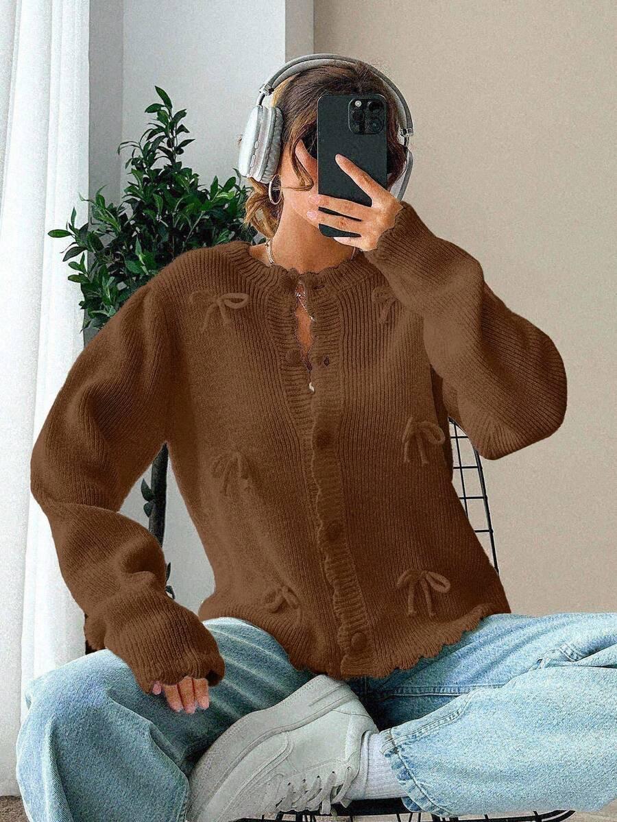 rozpinany brązowy sweter kokardki