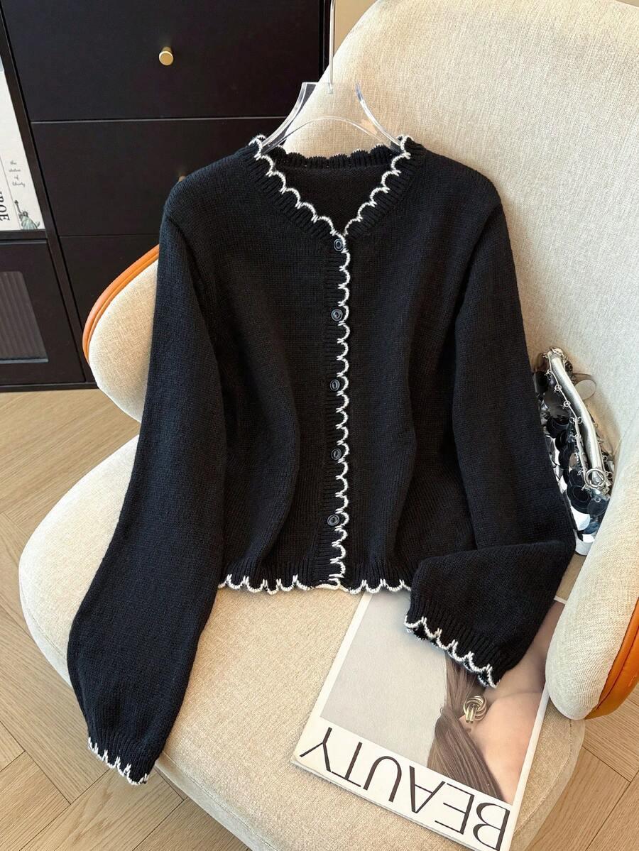 CZARNY SWETER GUZIKI