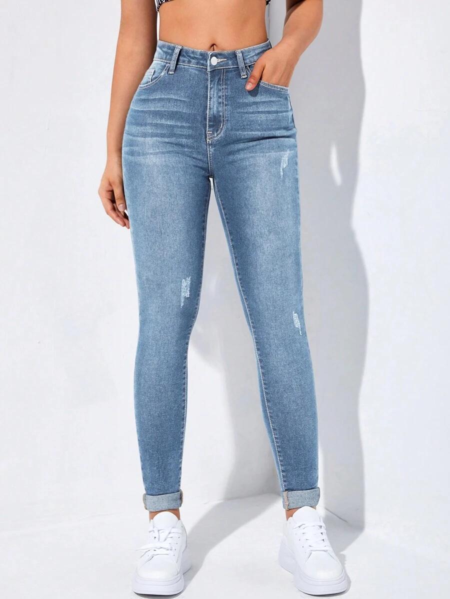 NIEBIESKIE SPODNIE JEANS PRZETARCIA
