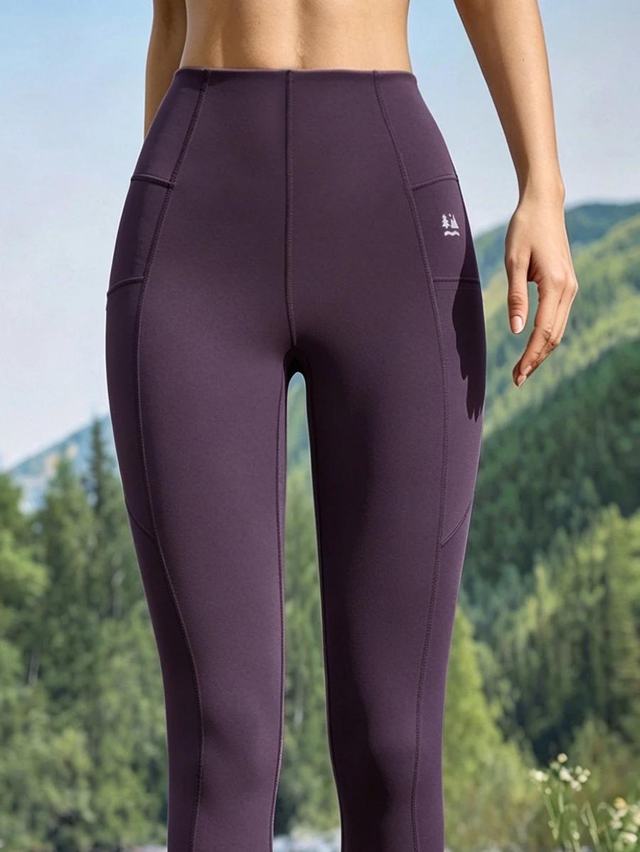 fioletowe legginsy kieszenie