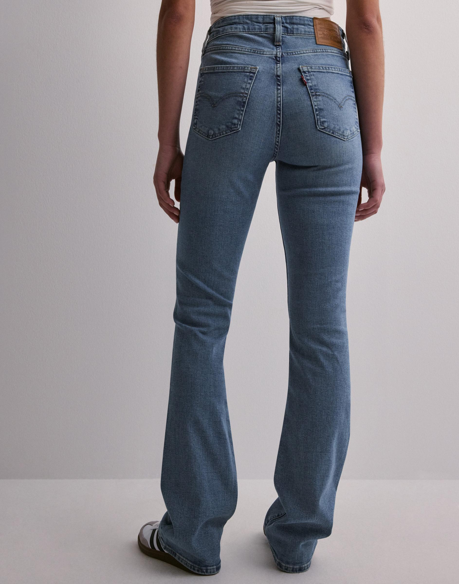 niebieskie jeansowe spodnie BOOTCUT