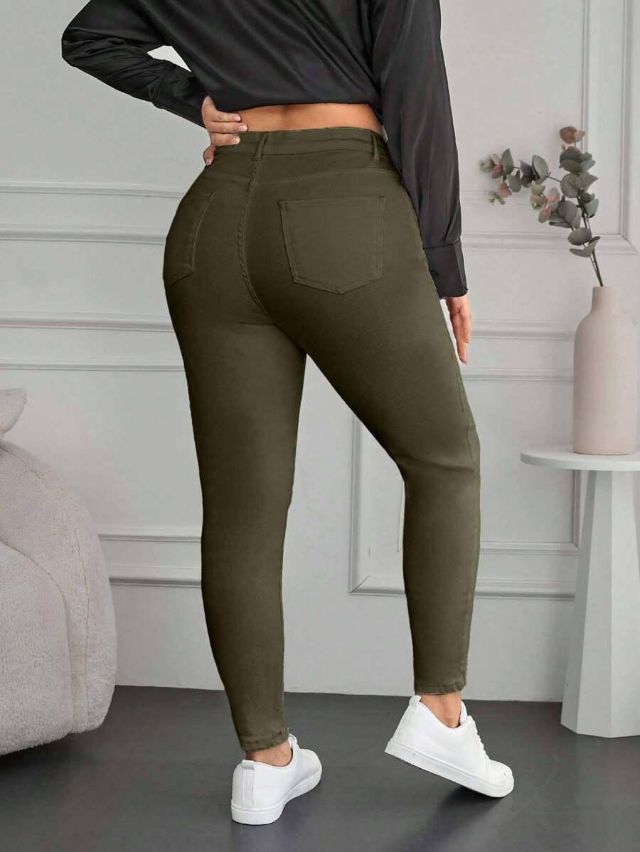 zielone spodnie jeansowe