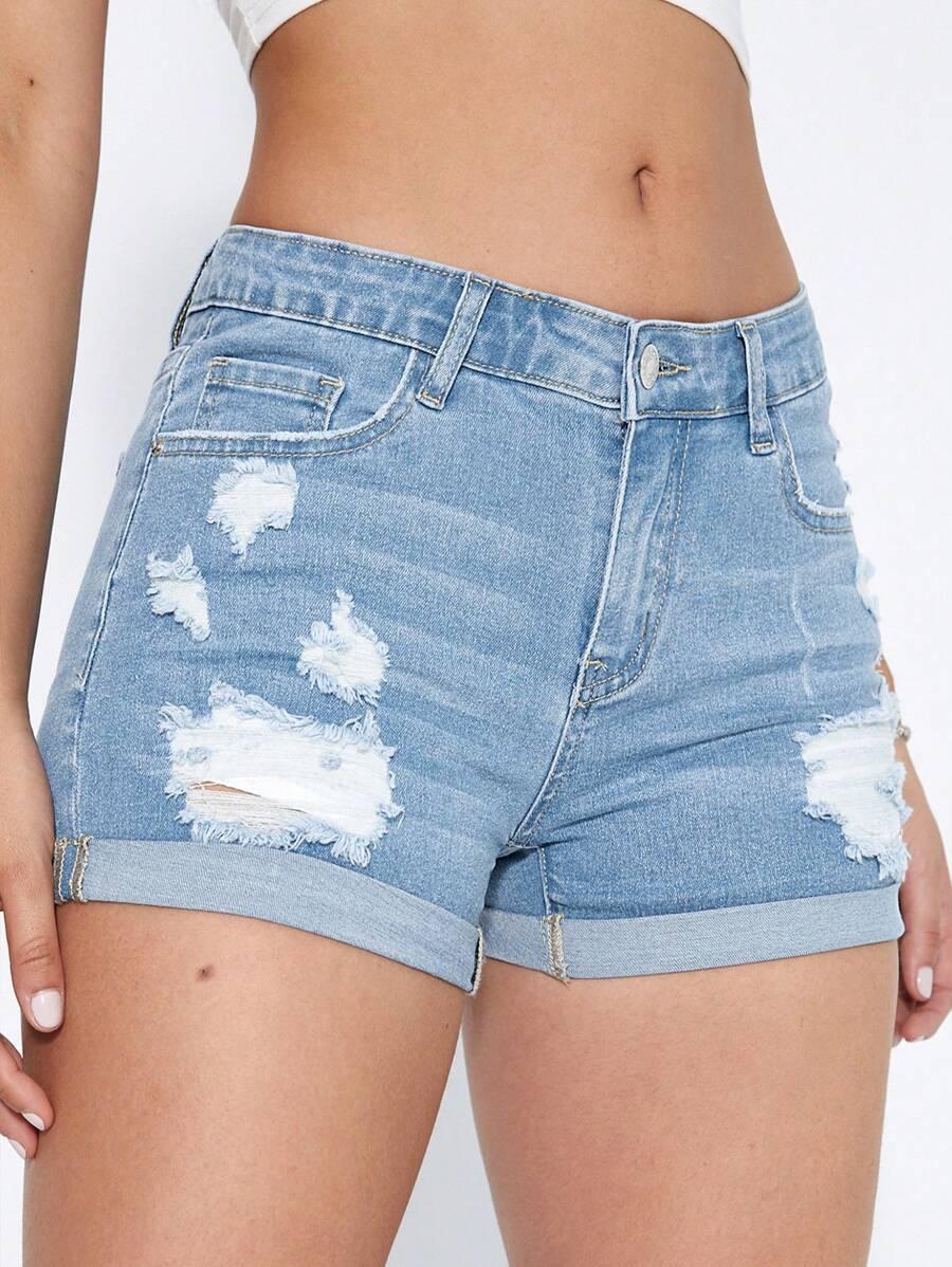 niebieskie spodenki jeans przetarcia