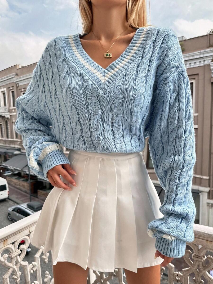 niebieski sweter v-neck