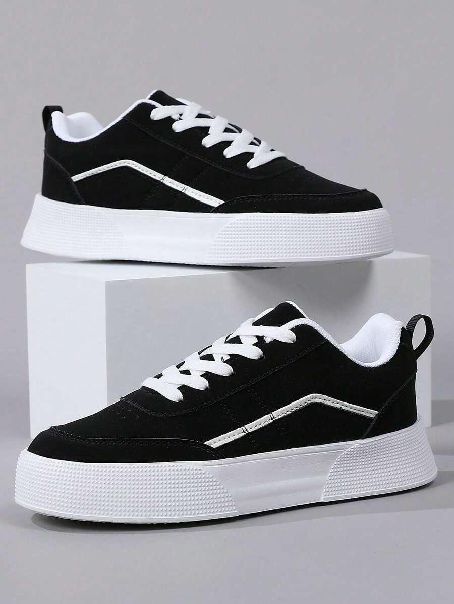 sznurowane czarne buty sportowe